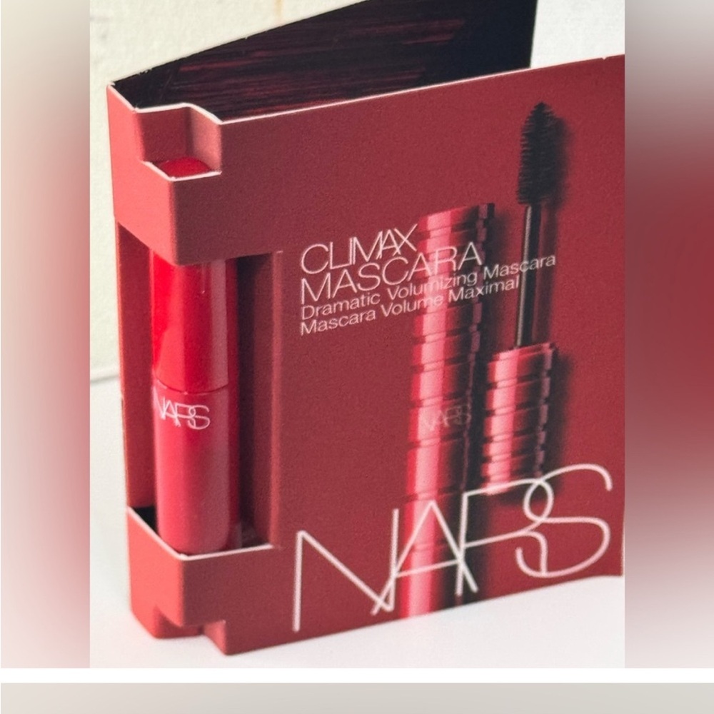 NARS 2 Piece Black eyelashes,&eyebrow brush. And a mini Red lip gloss.
